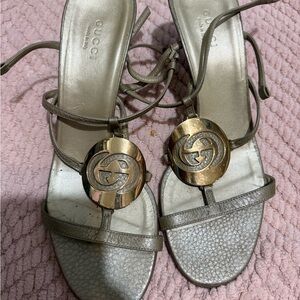 Gucci Gold Leather Logo Medallion Strappy Heels